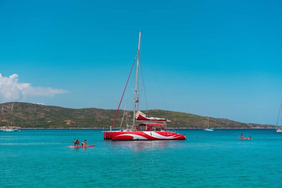 Cruising on a sailing maxi-catamaran - A generous Corsican lunch served on deck