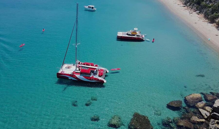 Cruising on a sailing maxi-catamaran - Snorkeling, paddling, and free time in clear water