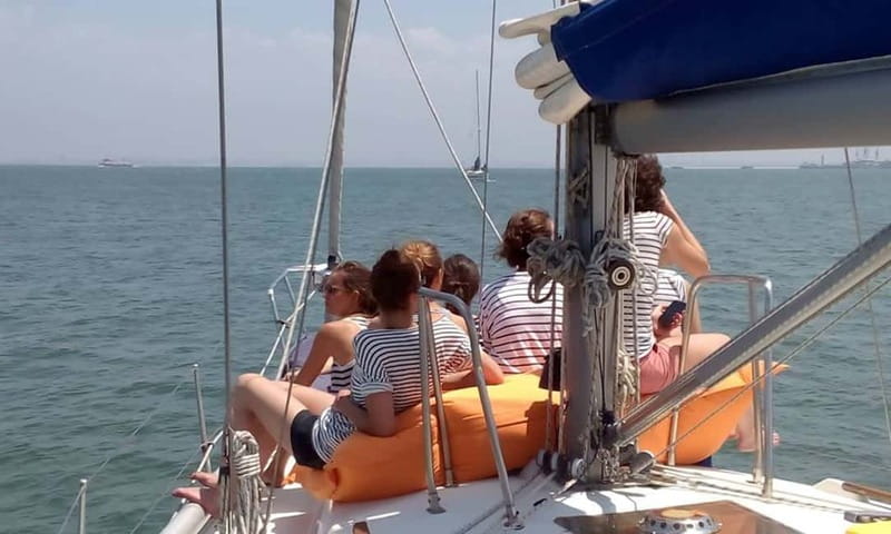 Cultural Sailing Tour in Lisbon - Live guides, wine, and the mood onboard