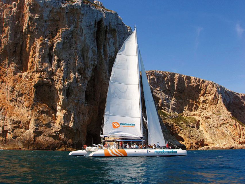 Dénia & Jávea: Portixol Sailing Catamaran Excursion with BBQ - The Portixol swimming stop