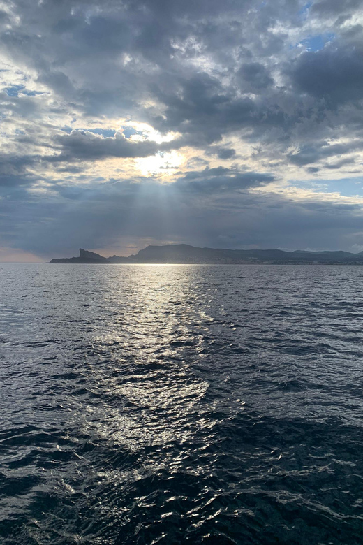 Departure from BRUSC sunset on sailing catamaran - Leaving Brusc as the Evening Cools