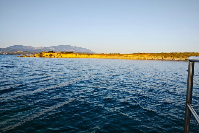 Dreamy Sails - Sunset Tour With Dinner And Wine - Xi Beach after dark