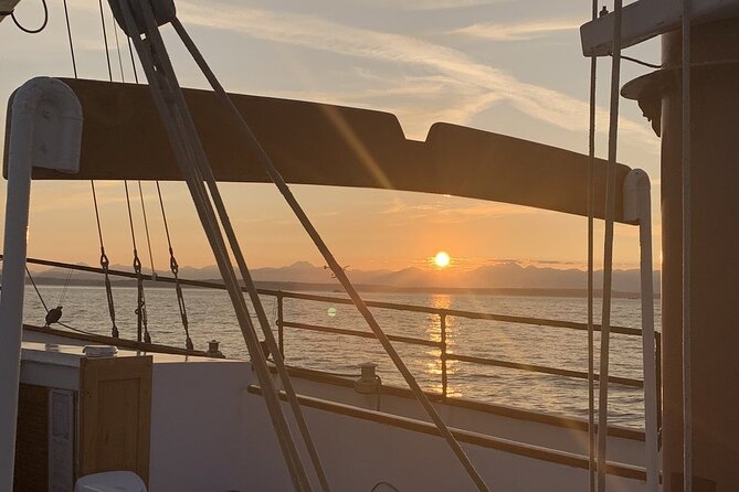 Evening Colors Sunset Sail Tour in Seattle - Raising the sails, then slowing down