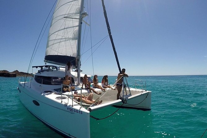 Exclusive Sailing Catamaran Experience to Lobos Island with lunch - Snorkeling, Kayaking, and Paddleboarding