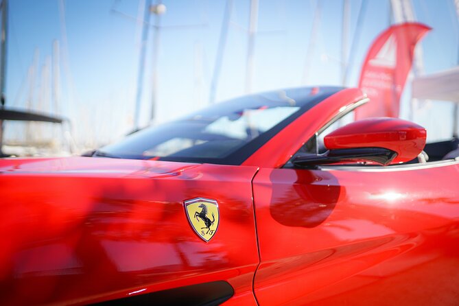 Ferrari Car Driving & Sailing Experience Barcelona - Taking the wheel of the red Ferrari California