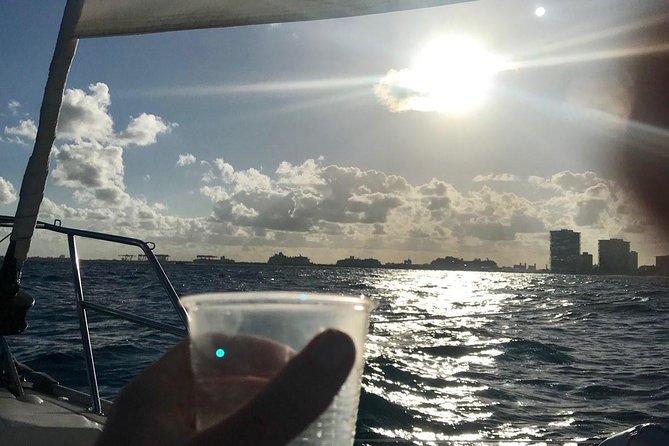Fort Lauderdale Sailing Charter - Raising the sails on the Atlantic