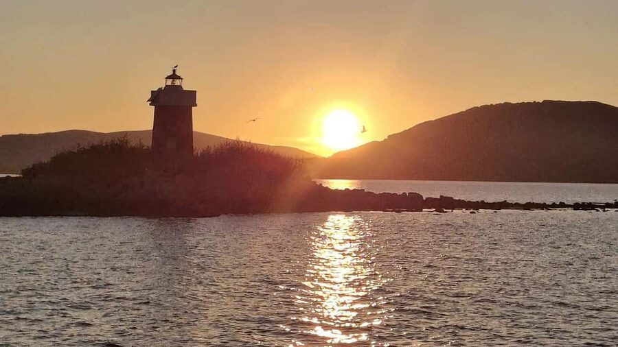 From Alghero: sunset on a sailing boat with aperitif - Leaving Alghero as the sun drops