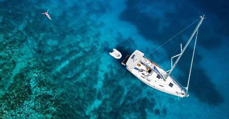 From Chania: Fully Private Sailing Cruise with Meal & Drinks - Setting out from Souda with red sails