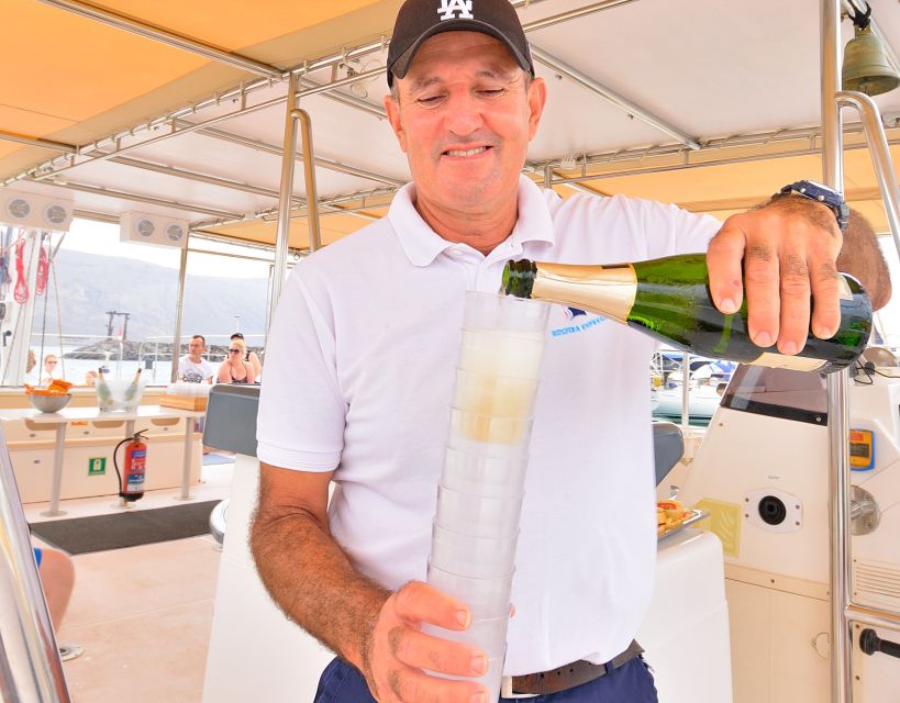 From Lanzarote: Sailing Day Trip Around La Graciosa - Boarding the catamaran with cava and snacks