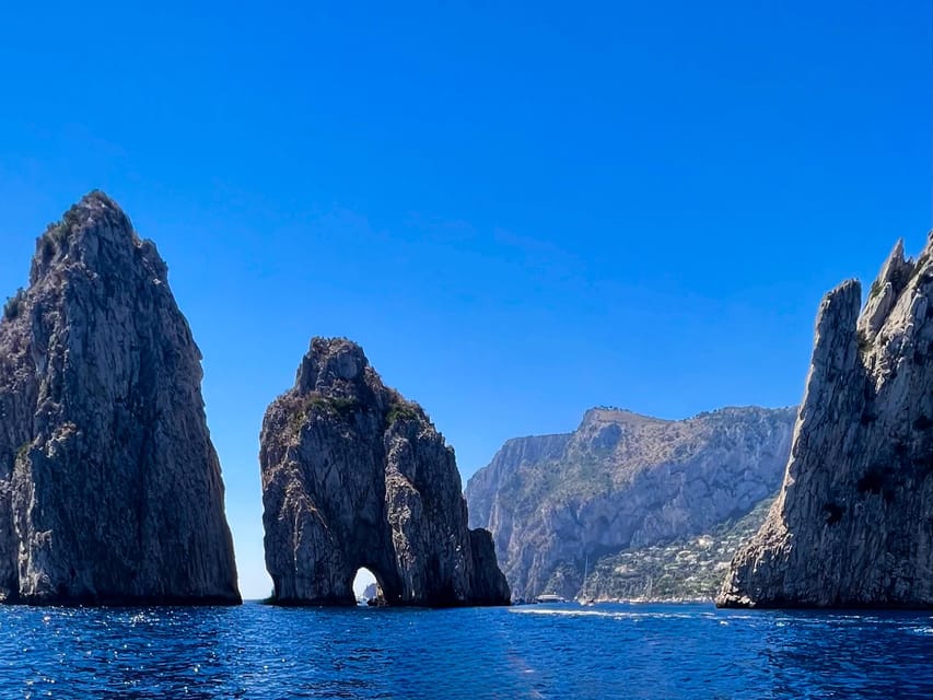 From Positano: Sail to Capri's Stunning Beauty - Approaching Capri by Its Caves and Cliffs