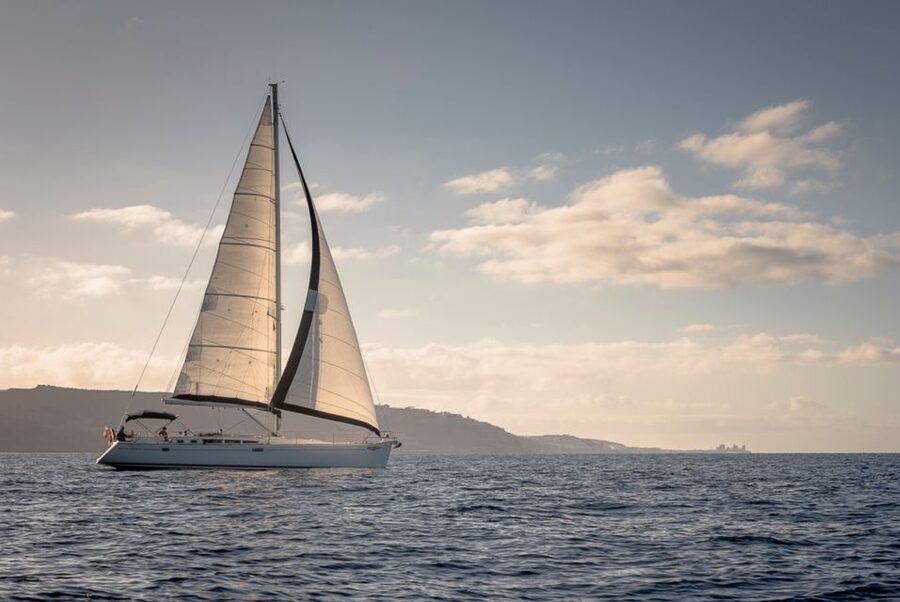 From Puerto de Mogán: Sailboat Trip with Food and Drinks - The beach stop: snorkeling, swimming, and quiet water
