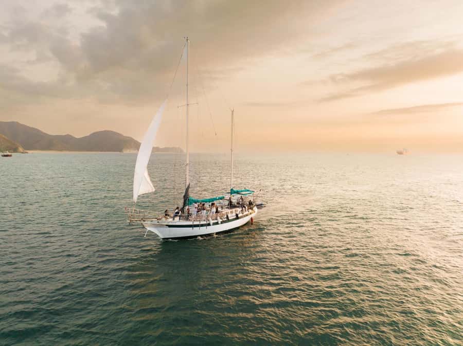 From Santa Marta: Sunset Sailboat Tour with 2 Beverages - The first hour: Santa Marta Bay from a sailboat