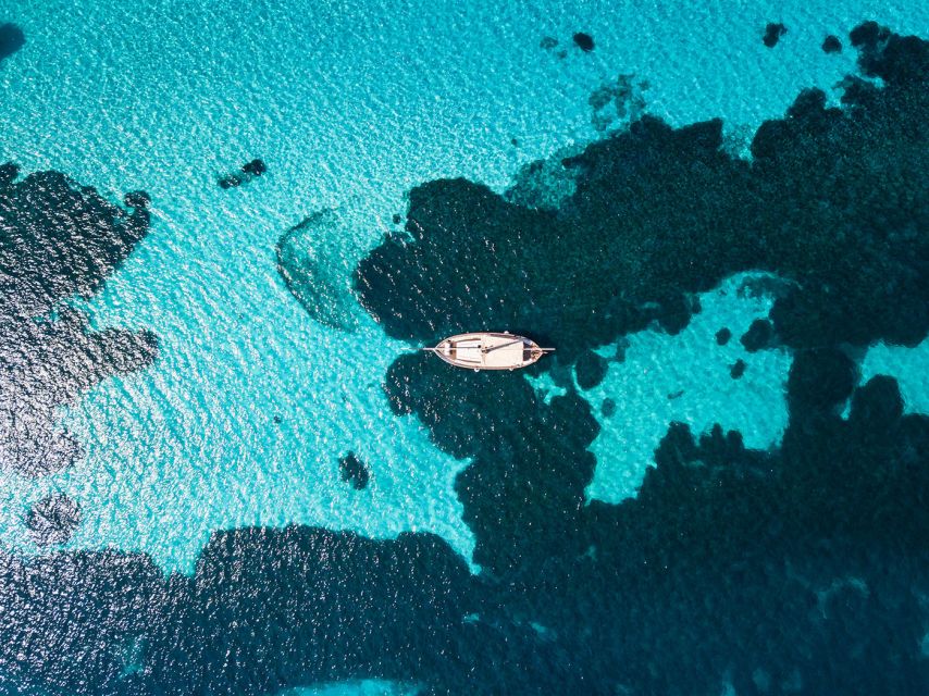 From Stintino: Asinara Vintage Sailing Boat Tour with Lunch - Cala Reale and Asinara’s former quarantine station