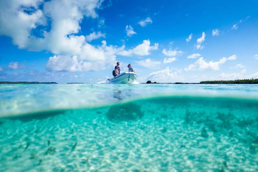 From Tahiti: Tetiaroa Island Tour by Sailing Catamaran - Arriving by dinghy on Tetiaroa