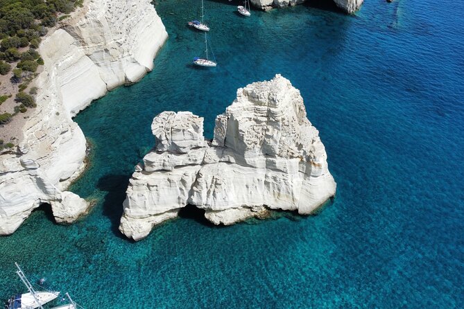 Full day private sailing cruise around Milos island - From Adamas to Klima, Skinopi, and Arkoudes