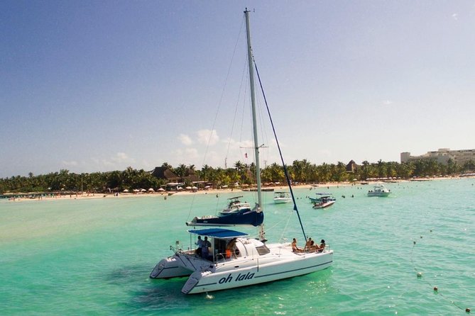 Full-Day Sailing Adventure to Isla Mujeres - Boarding at Playa Langosta and finding your place on deck