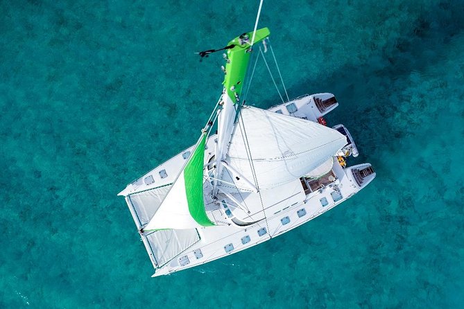 Full-Day Sailing Adventure to Isla Mujeres - Snorkeling: included, but never guaranteed
