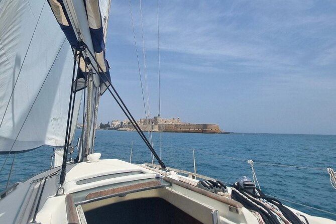 Full Day Sailing Tour Catania-Acitrezza - Acitrezza: one hour with a choice to make