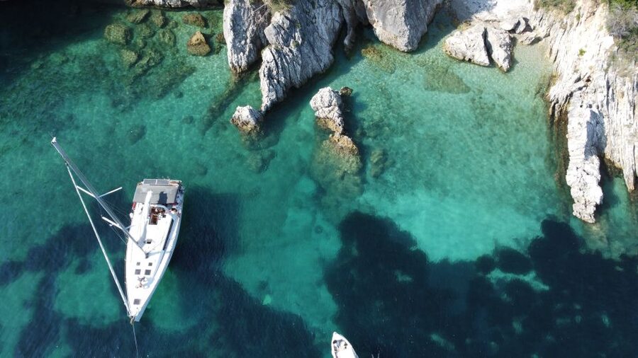 Gouvia: Corfu Island Sailing Trip with Snack and Soft Drinks - Barbati Beach brings the first clear-water swim