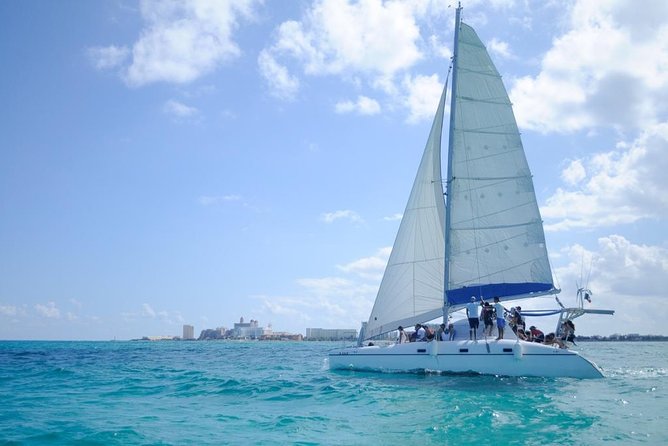 Half Day Sailing Private Catamaran to Isla Mujeres - Snorkeling at the reef and underwater museum