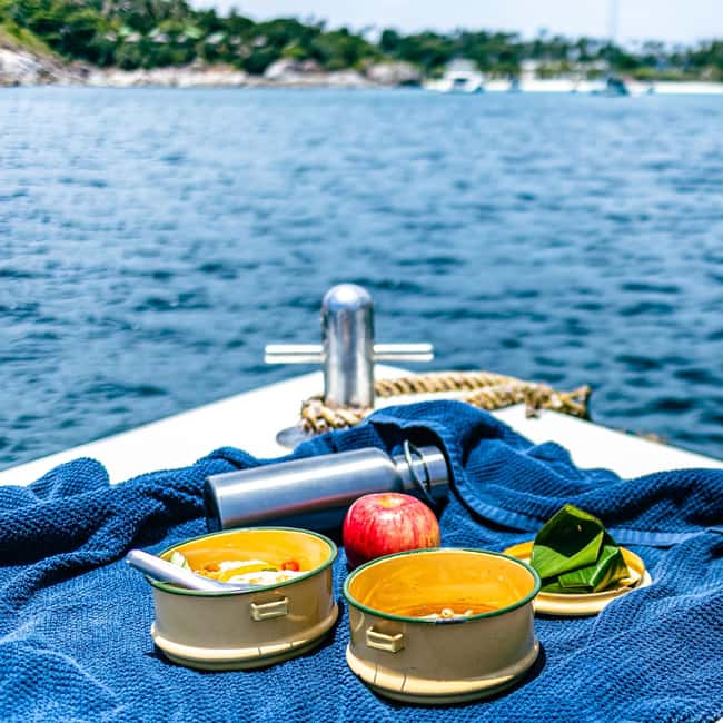 Half-Day Sailing Tour in Catania with Aperitif on Board - Aci Castello and the volcanic coast