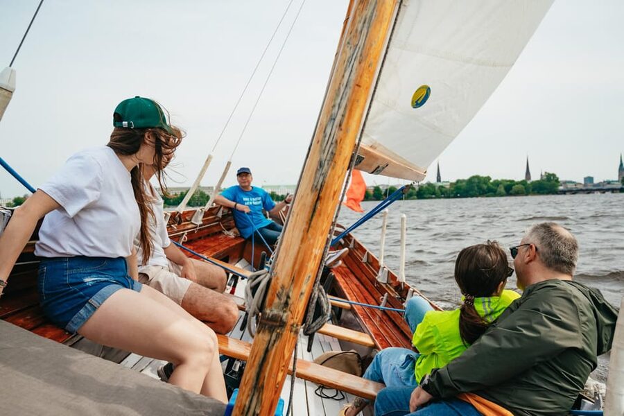 Hamburg: Alster River Sailing Tour on a 2-Masted Sailboat - Helping with the sheets, sails, and tiller