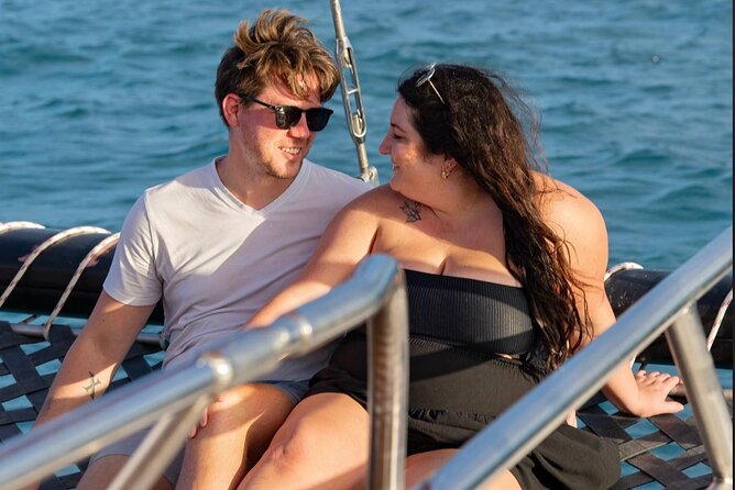 Honolulu Sunset Sail from Kewalo Harbor Including Drinks - Drinks, music, and the party-boat mood