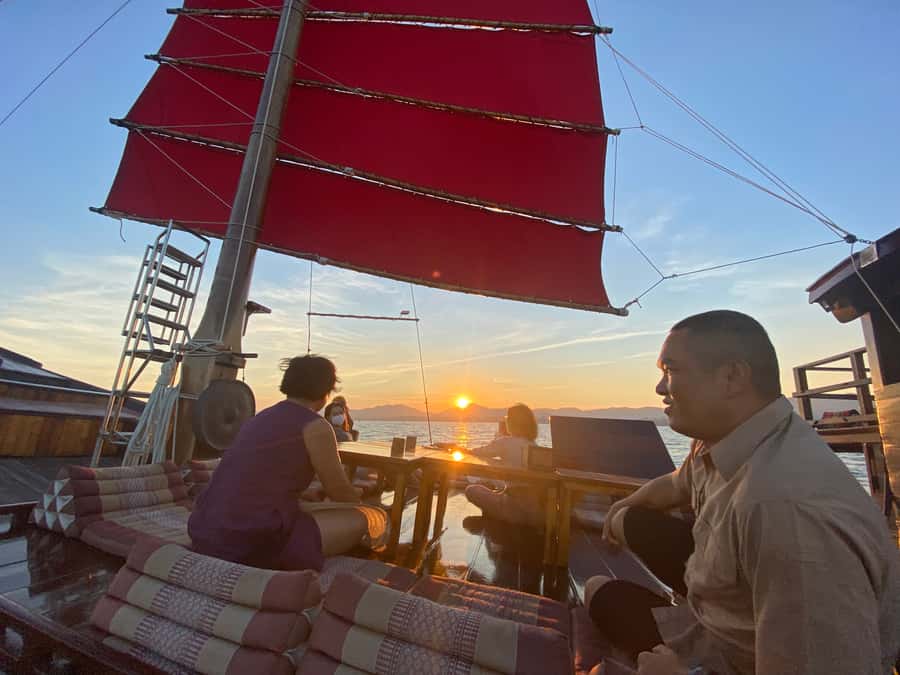 Hua Hin: Siamtara Sunset Sailing Dinner Cruise with Pickup - Sunset, Coastline Lights, and the Return to Port