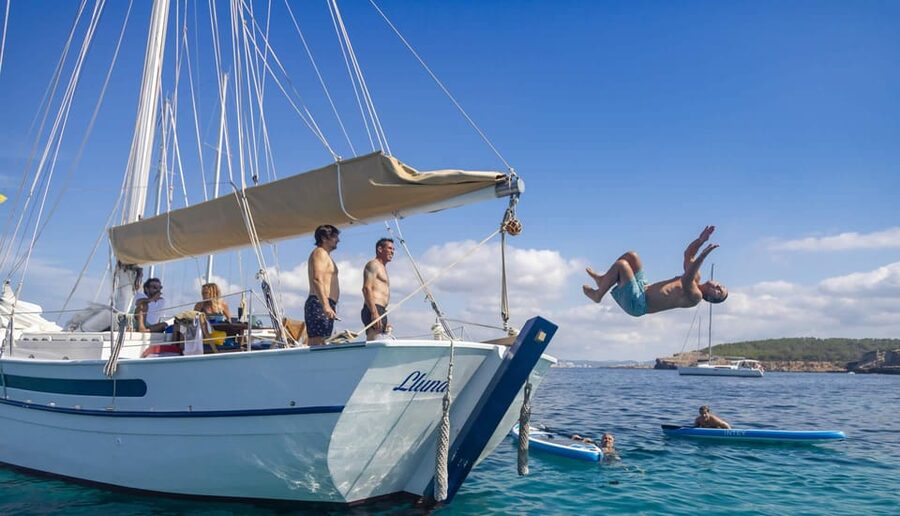 Ibiza: Private Sailboat with Premium Open Bar, Food & Music - Returning to Sea Before Cala Comte