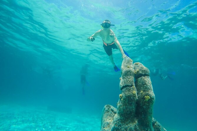 Isla Mujeres Catamaran Luxury Sailing Experience from Puerto Morelos - Lunch, open bar, and the party-boat mood