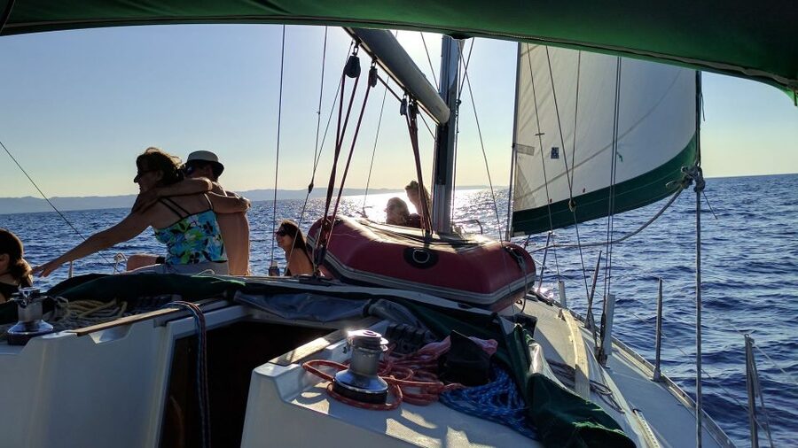 Kassandra: Sunset Sailing Boat Tour of Secluded Coves - Watching the sun set from the Aegean