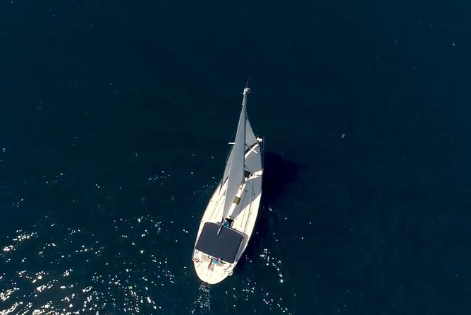 Kassiopi Private Daily Sailing Yacht Cruise - Choosing lunch at a seaside restaurant