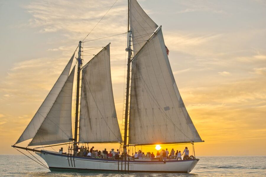 Key West: Windjammer Champagne Sunset Sail - Raising the sails on Appledore II