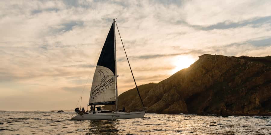 Knysna Sunset Sailing Cruise with Light Dinner and Wine - The sunset, sparkling wine, and snack platter