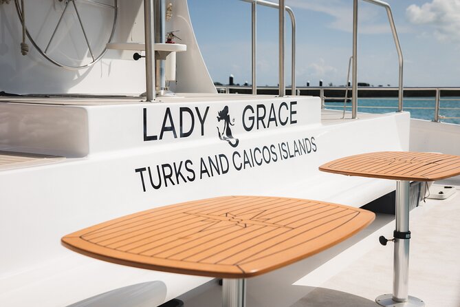 Lady Grace Signature Catamaran Sunset Sail from Ritz-Carlton - Boarding Lady Grace, champagne first