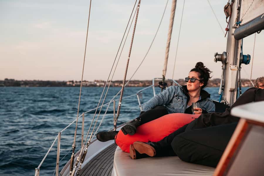 Lake Taupo: Classical Sailing to the Māori Rock Carvings - Local stories, hot drinks, and a drink on the way back