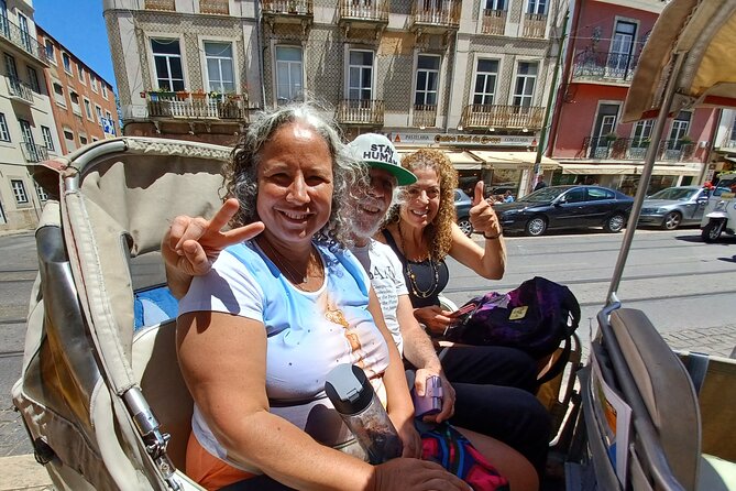 Lisbon Adventure: 2 Hours Tuk-Tuk Tours and 2 H Sunset Sailing - Rossio, Santa Justa, and Lisbon’s central landmarks