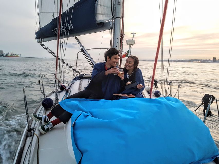 Lisbon: City Skyline Sailboat Cruise with Drink and Snacks - A calm start beneath the 25 de Abril Bridge