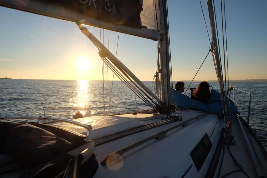 Lisbon: City Skyline Sailboat Cruise with Drink and Snacks - Cristo Rei and the 25 de Abril Bridge