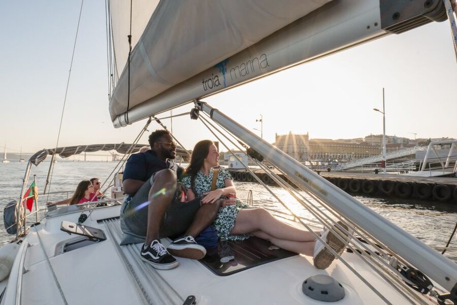 Lisbon: Daytime/Sunset/Night City Sailboat Tour with Drink - The city center from Commerce Square to Alfama