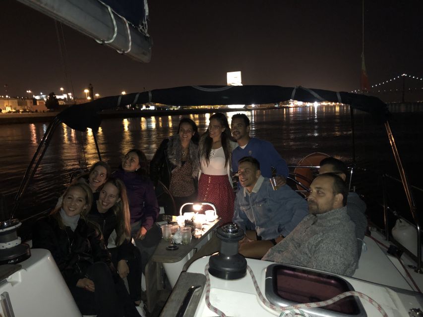 Lisbon: Luxury Sailboat Cruise at Night - Commerce Square, the Castle Quarter, and Alfama