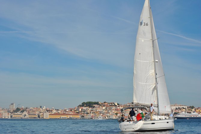 Lisbon New Years Eve Sailing Tour - The bridge, Christ the King, and Lisbon after dark