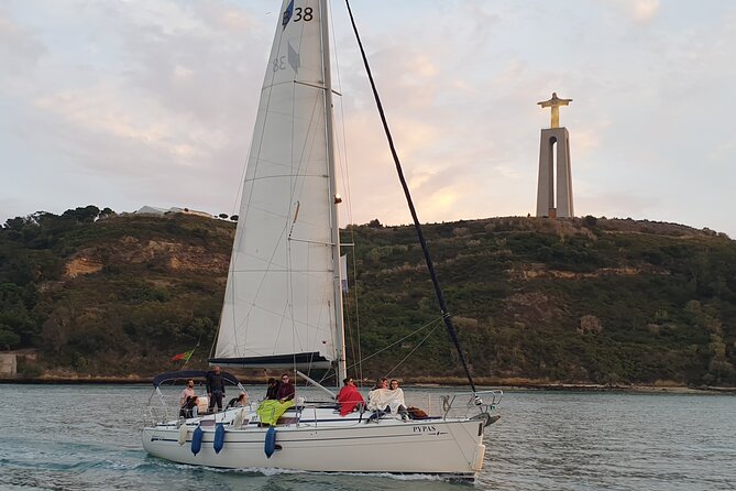 Lisbon Private Sailing Cruise with Locals - A welcome drink, with sensible limits