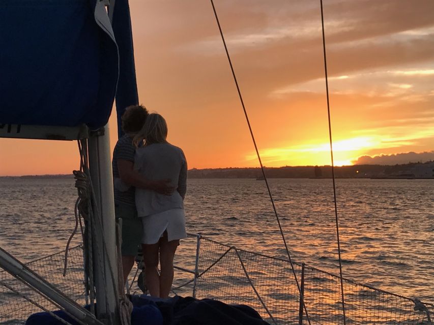Lisbon: Private Sunset Sailing Tour with Champagne - Crossing toward the south bank