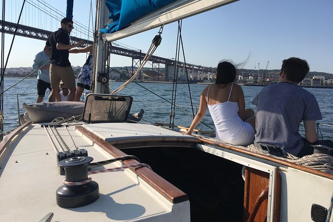 Lisbon Sailing Day Cruise with wine & snacks - Wine, Snacks, and the Mood on Board