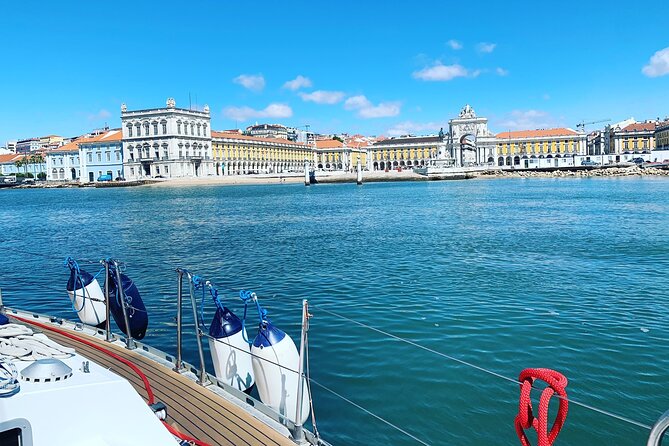 Lisbon Sailing Tour: 2-Hour Cultural Scenic Cruise with Wine - Ponto Final, Time Out Market, and city life along the shore