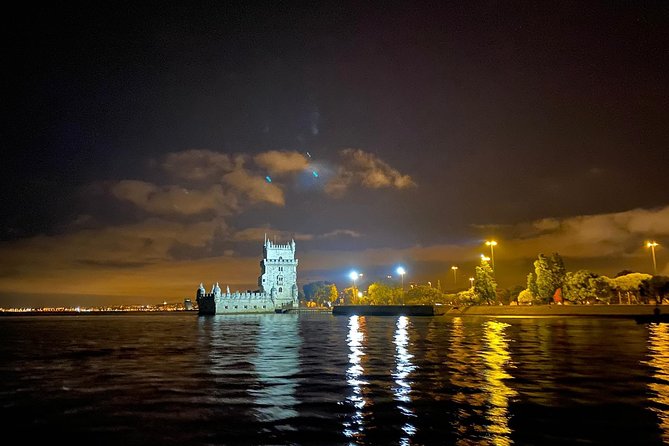 Lisbon Sailing Tour by Night - Commerce Square and São Jorge Castle after dark