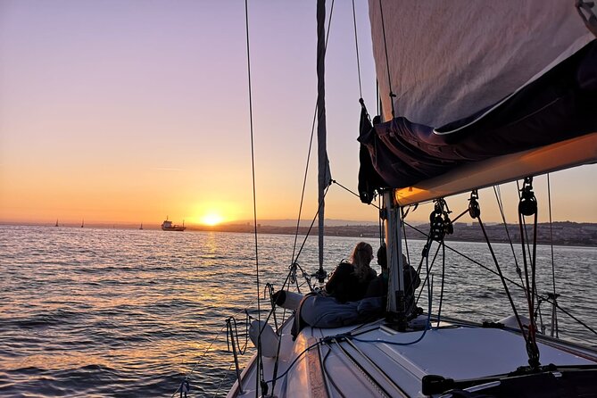 Lisbon Small Group 2h Sunset Sailing- Live Commentary & a Drink - Commerce Square and the old city above it