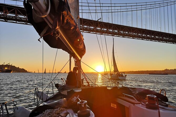 Lisbon Small Group Sunset Sailing 2h Cruise with Drinks Included - Drinks, commentary, and the mood onboard