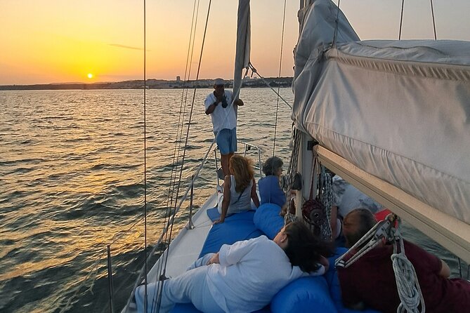 Lisbon: Sunset Sailboat Tour on the Tagus River + Welcome Drink - Sparkling wine, snacks, and what is covered